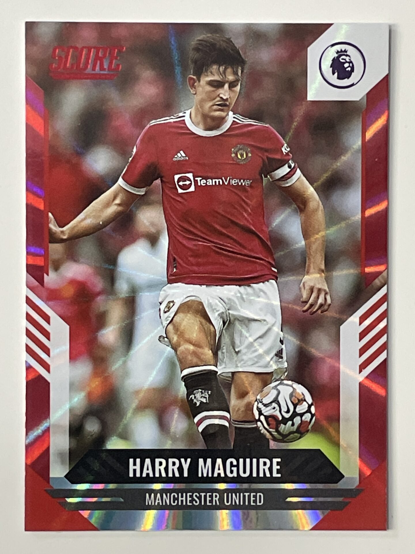 Harry Maguire Manchester United Base Red Laser Parallel Panini Premier League Score 2021 2022